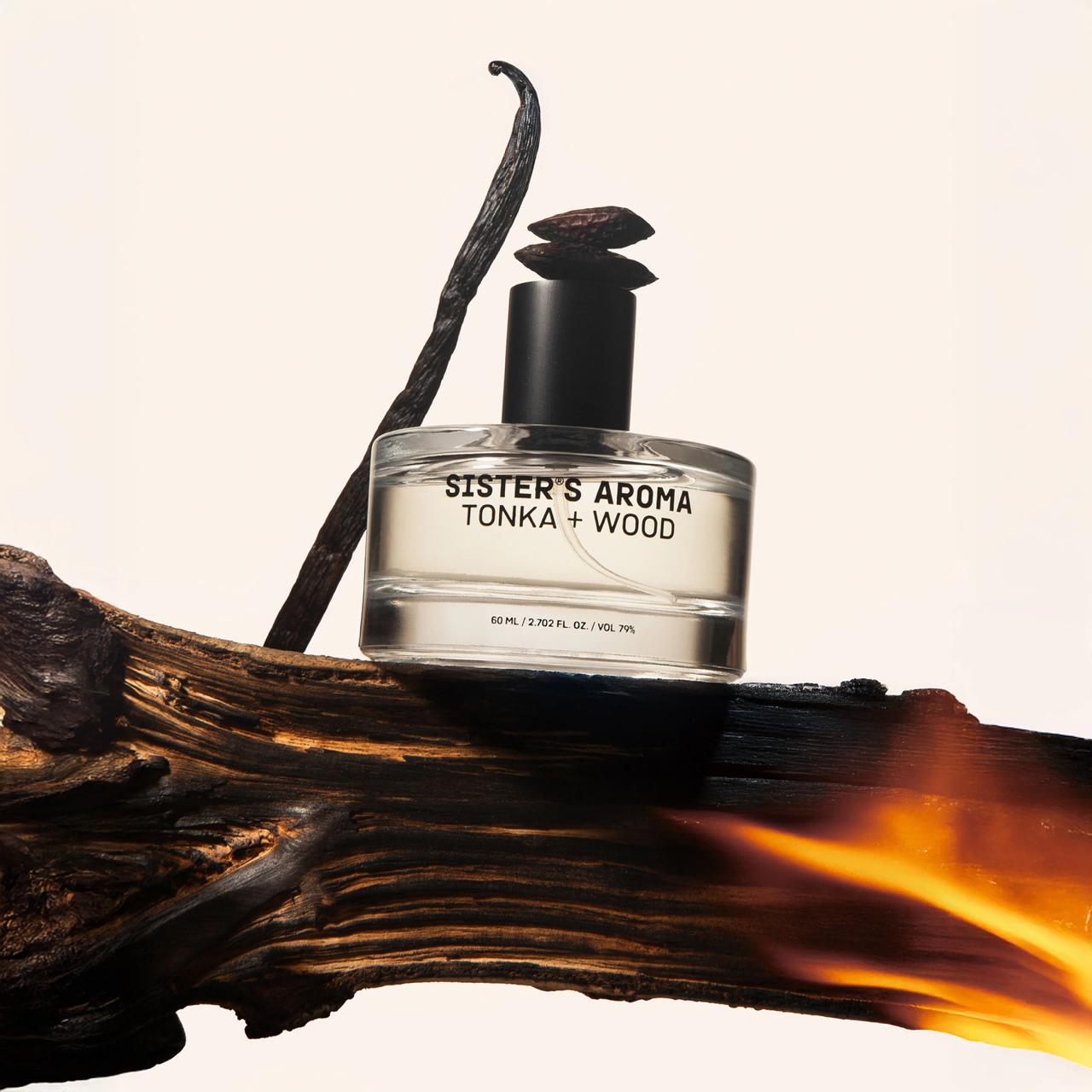 Car perfume Sister's Aroma Tonka + Wood on a wooden branch with vanilla bean