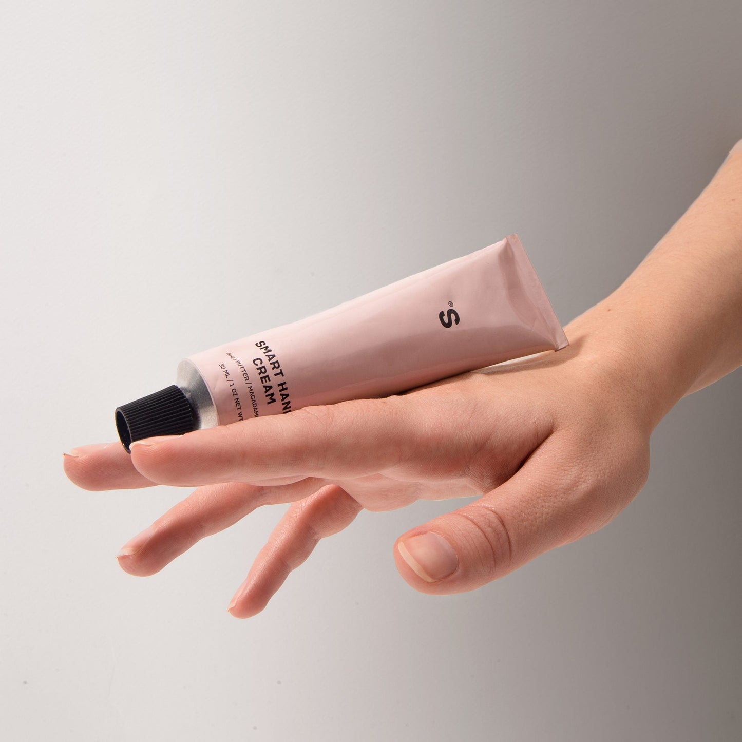 sister's aroma hand cream passion fruit on a grey background