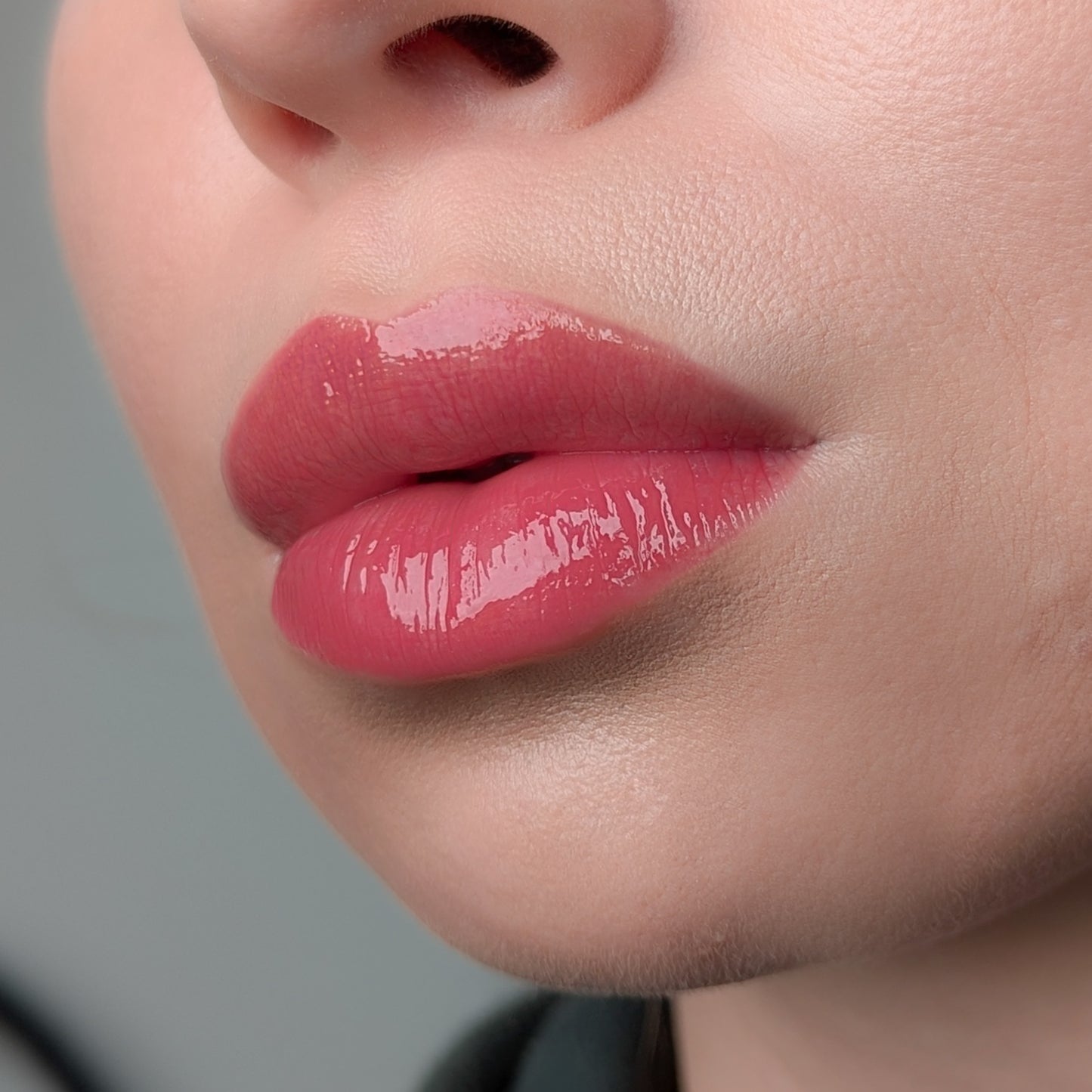 lipss lip gloss cherry applied on lips