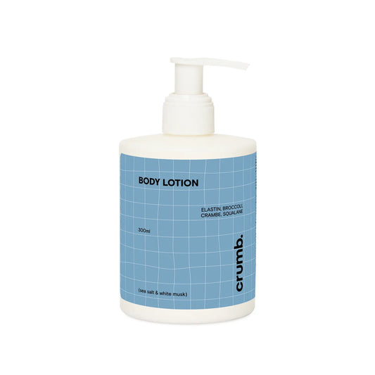 Crumb Body Lotion Sea Salt & White Musk bottle with blue label and white pump on a white background