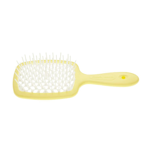 Janeke Yellow hairbrush on a white background