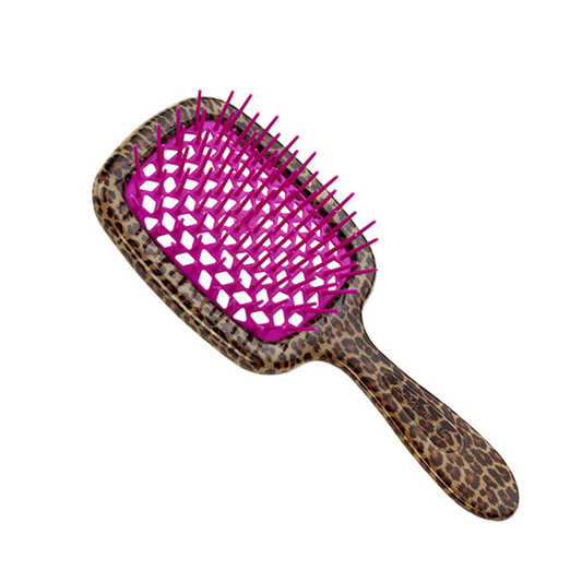 Janeke hairbrush with pink bristle head and leopard print handle on a white background
