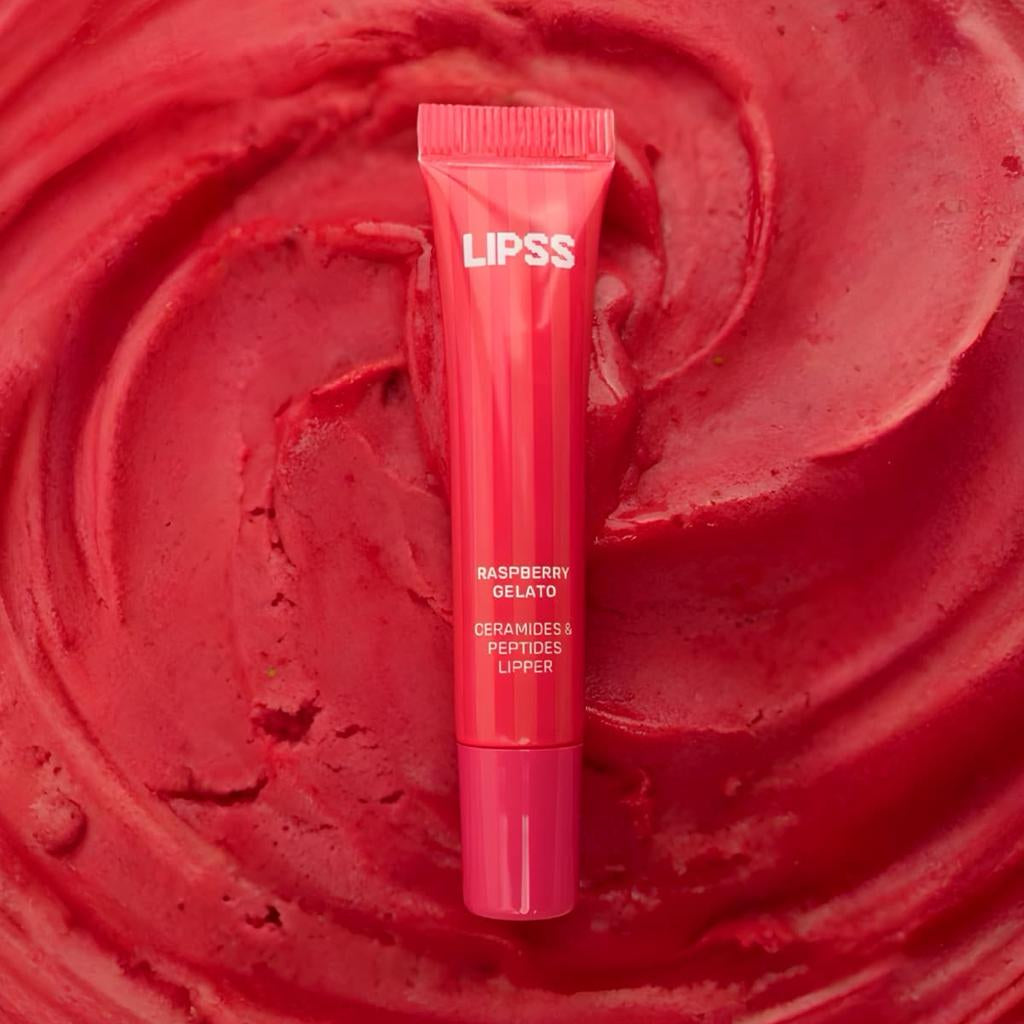 Lip gloss LIPSS raspberry gelato on a red textured background 
