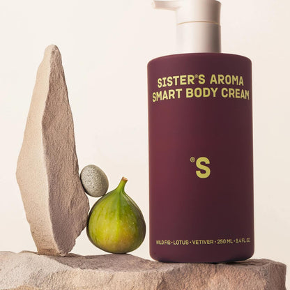 Sister's Aroma Body Cream Fig with a fig and stone on a neutral background